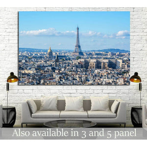 Paris skyline canvas print with Eiffel Tower above city rooftops in a modern living room