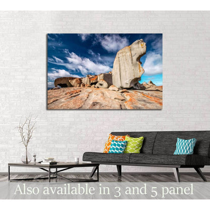 Remarkable Rocks canvas print with sculpted granite under blue sky above sofa in a modern living room