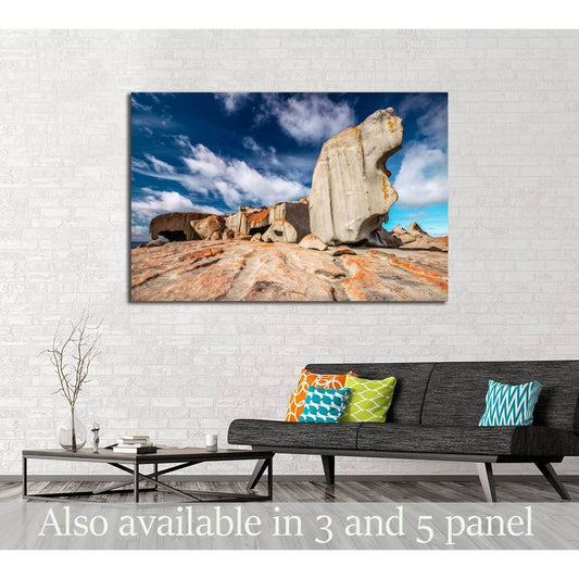 Remarkable Rocks canvas print with sculpted granite under blue sky above sofa in a modern living room