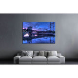 Rusty train bridge going over the harbor under a pink sunset №2062 Ready to Hang Canvas Print