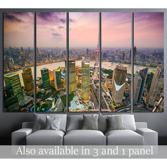 Shanghai skyline canvas print with Oriental Pearl Tower and Huangpu River at sunset above a gray sofa