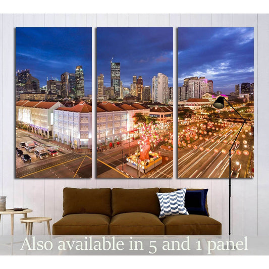 Triptych Singapore Chinatown canvas print with glowing lanterns above sofa in modern living room