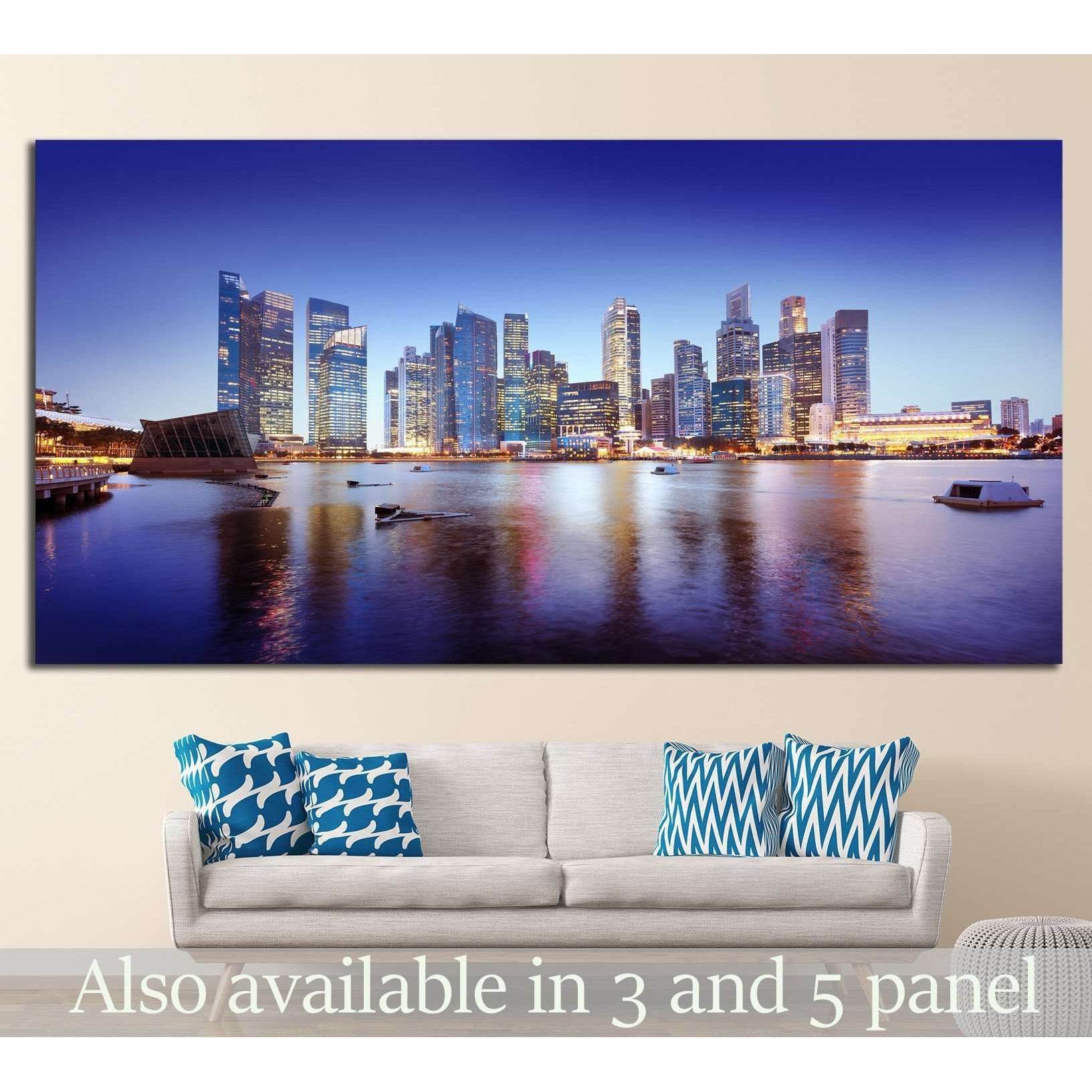 Singapore skyline canvas print above sofa in modern living room with Marina Bay reflections