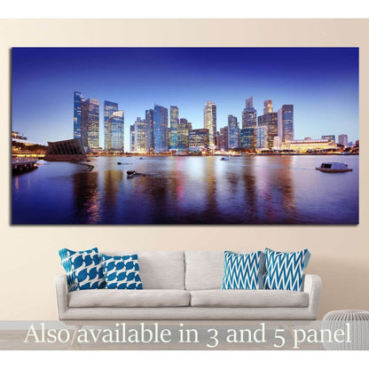 Singapore skyline canvas print above sofa in modern living room with Marina Bay reflections
