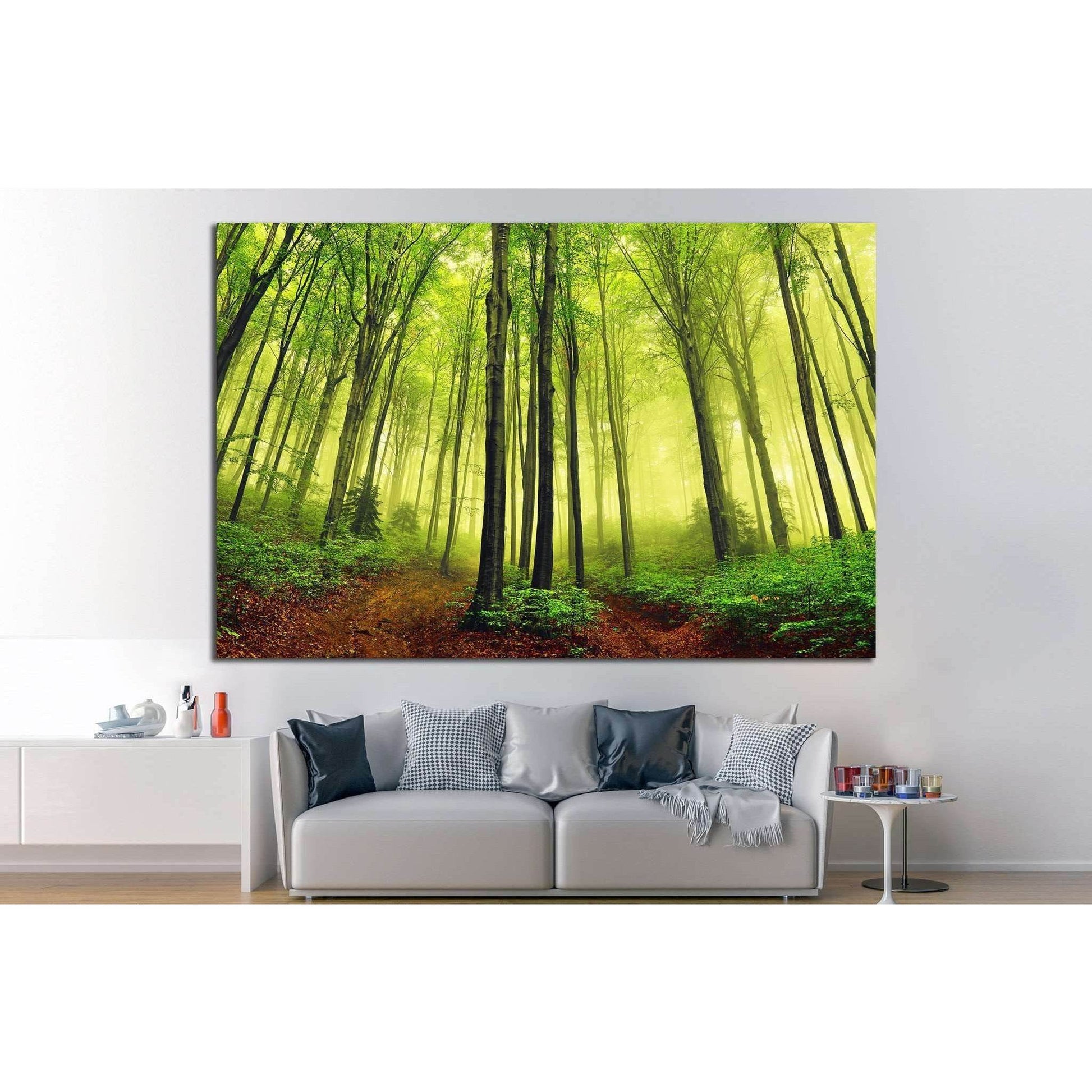 Forest Serenity Canvas Print - Peaceful Nature Wall DecorThis canvas print captures a lush forest scene bathed in a soft, diffused light, creating a peaceful and renewing atmosphere. The greenery's vivid shades and the forest's depth would complement spac