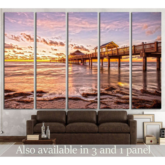 Sunset at Clearwater Beach Florida №1298 Ready to Hang Canvas PrintThis four-panel canvas print captures the serene beauty of a pier at sunset with golden skies reflecting on gentle waters. The warm colors offer a soothing effect, making it an ideal wall