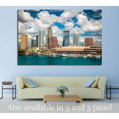 Tampa skyline canvas print above sofa with marina, turquoise water, and bright clouds