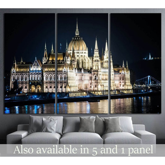 Budapest Parliament at night triptych canvas print above sofa in modern living room