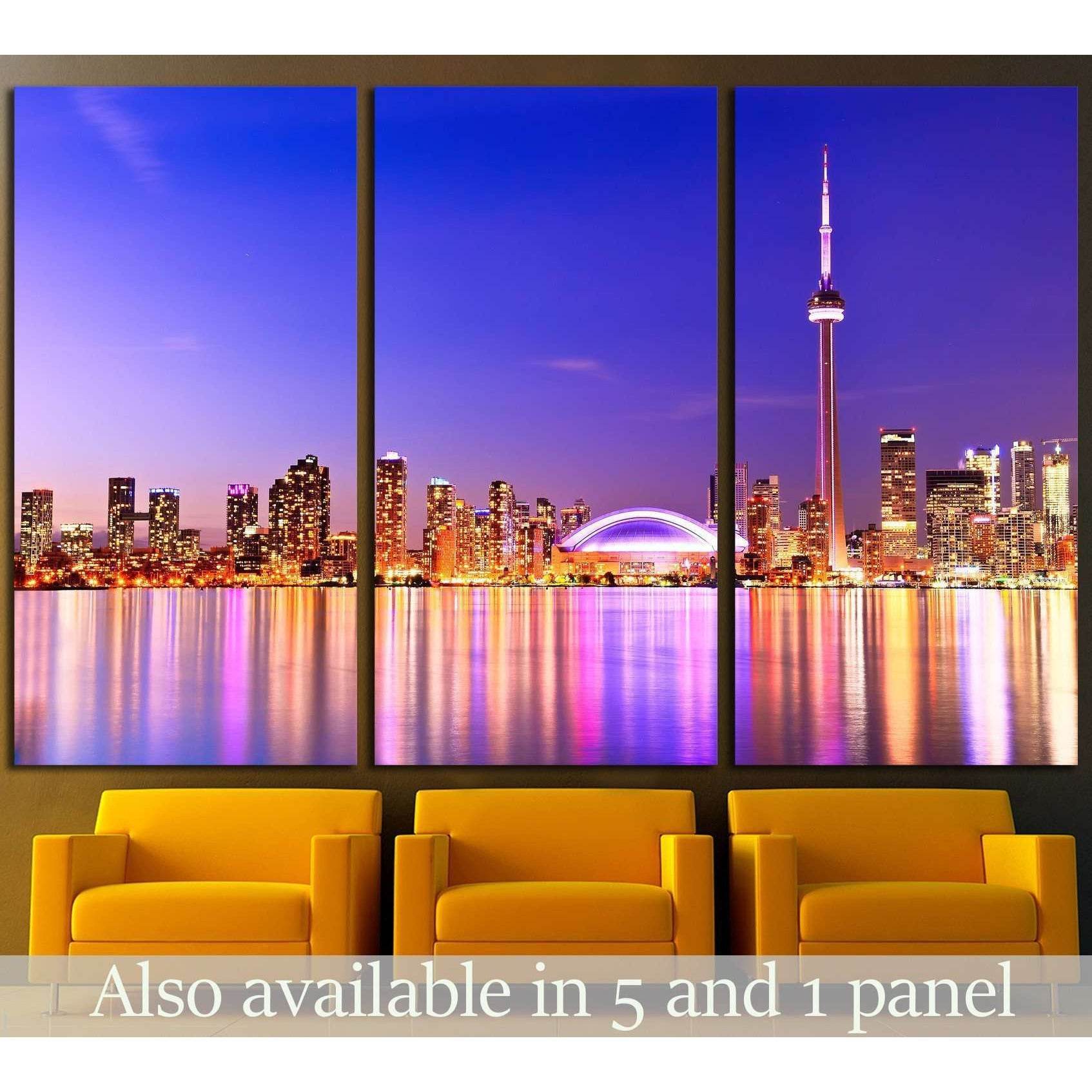 Toronto skyline triptych canvas print with CN Tower above chairs in a modern lounge