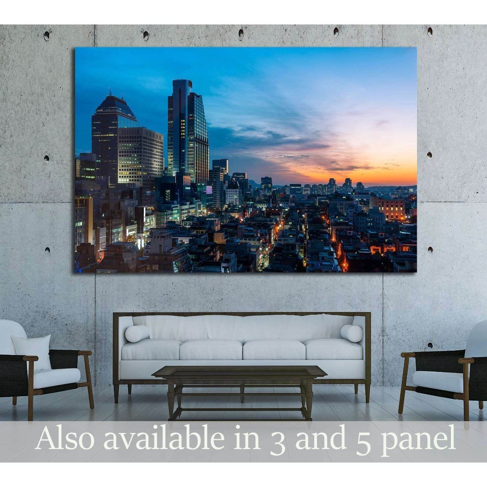 Seoul Gangnam skyline canvas print at sunset hung above a sofa in a modern living room