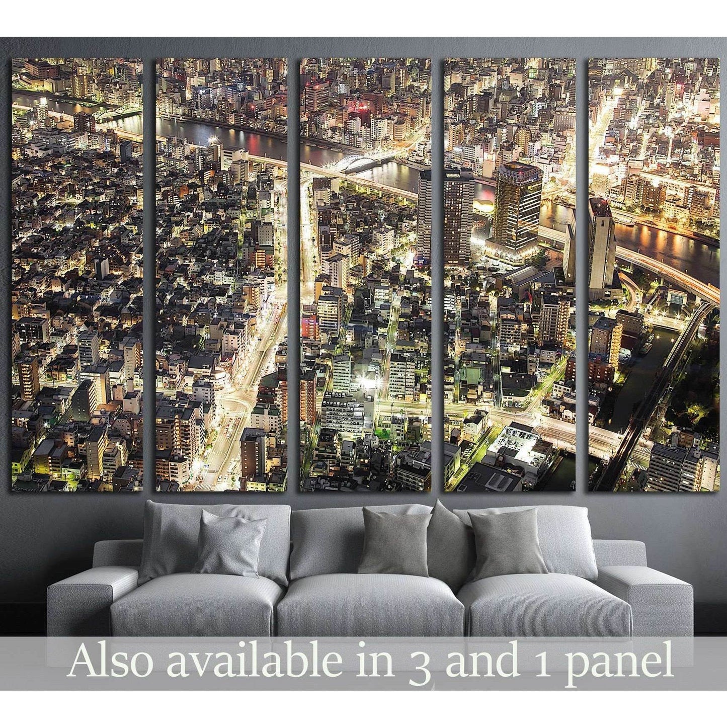 Tokyo night skyline canvas print in five panels above sofa in a modern living room