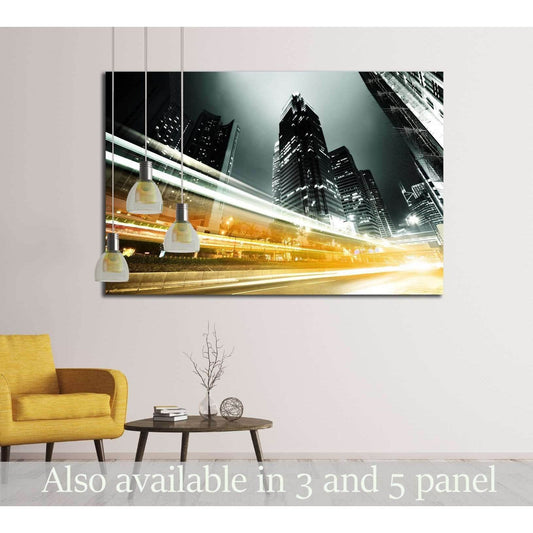 Hong Kong night traffic canvas print with golden light trails and skyscrapers in a modern living room
