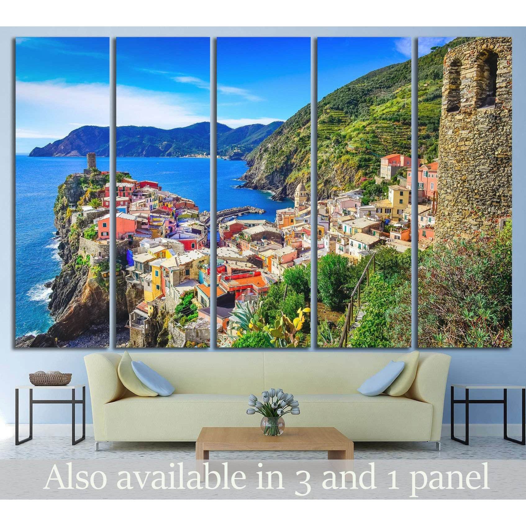 Vernazza Cinque Terre canvas print with colorful cliffside village and blue sea above sofa