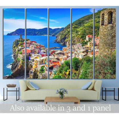 Vernazza Cinque Terre canvas print with colorful cliffside village and blue sea above sofa