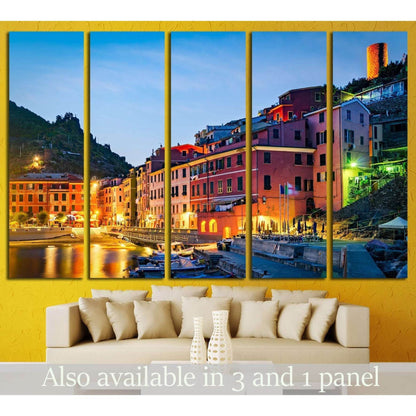 Vernazza Cinque Terre canvas print above sofa with twilight harbor and pastel hillside houses