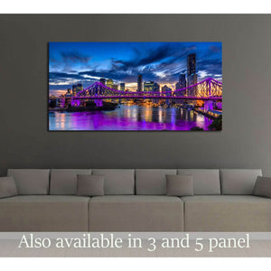 Brisbane Story Bridge canvas print with purple night lights above sofa in modern living room