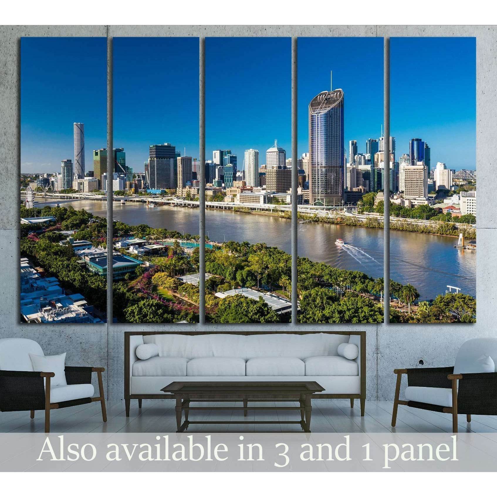 Brisbane skyline canvas print above sofa in modern living room with riverfront city view