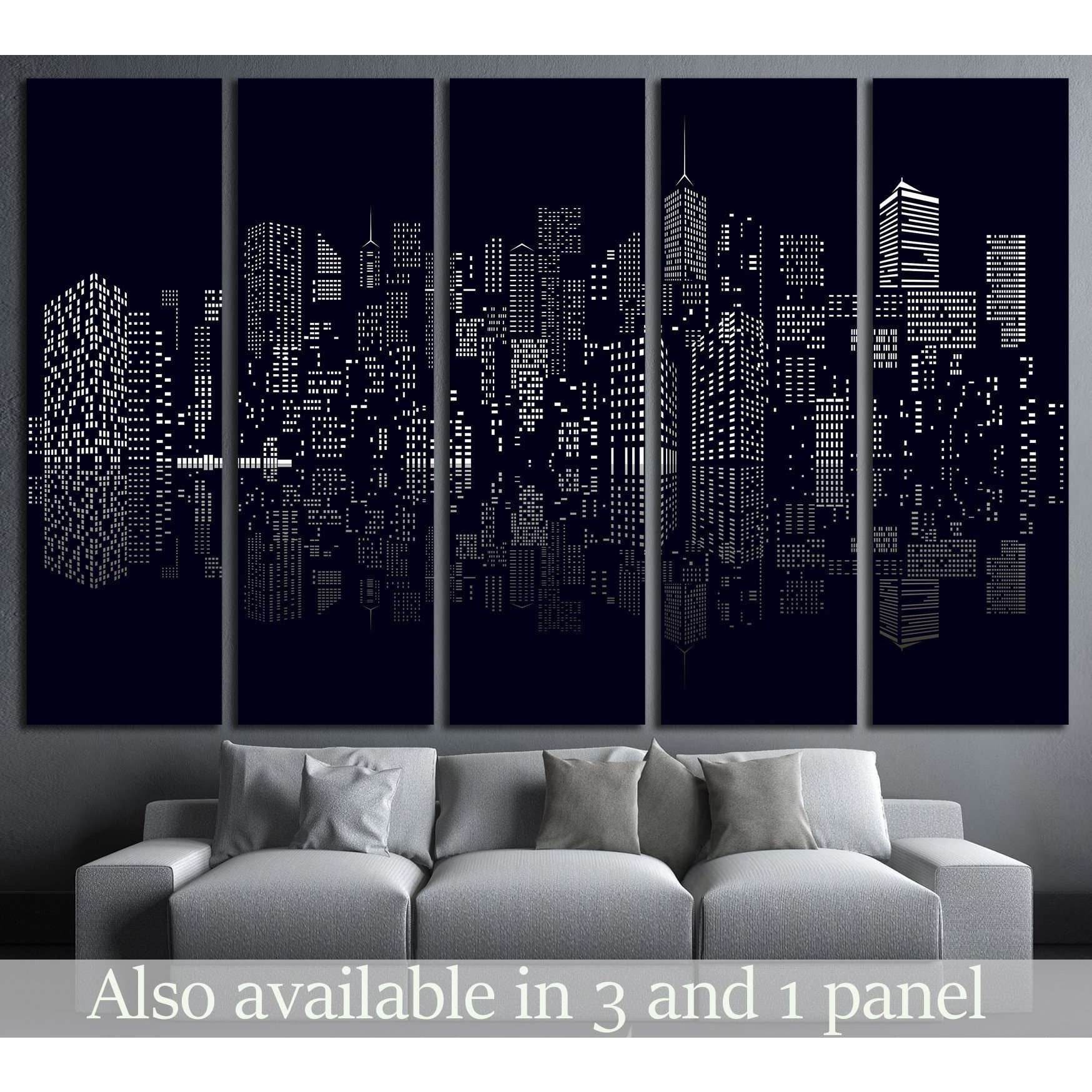 Black and white abstract city skyline canvas print hung above a gray sofa in a modern living room